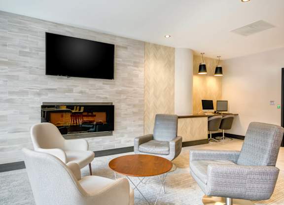 Clubroom With TV And Fireplace at 222 Saratoga, Baltimore, MD 21202