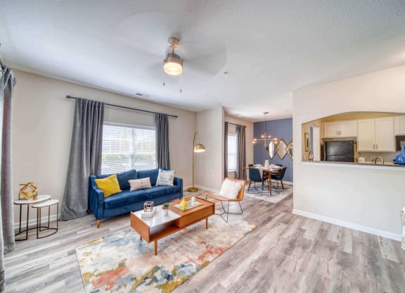 A spacious apartment living room at Meridian Obici, Suffolk, VA