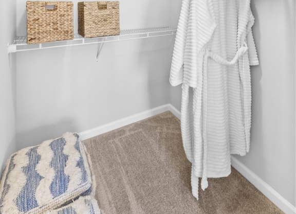 a walk in closet in a classic unit at Harbor Pointe, New Jersey, 07002