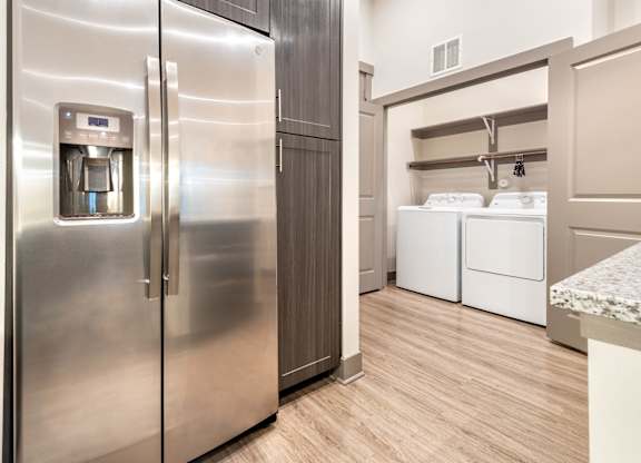 Kitchen and laundry at The Bridge at McKinney, McKinney Texas