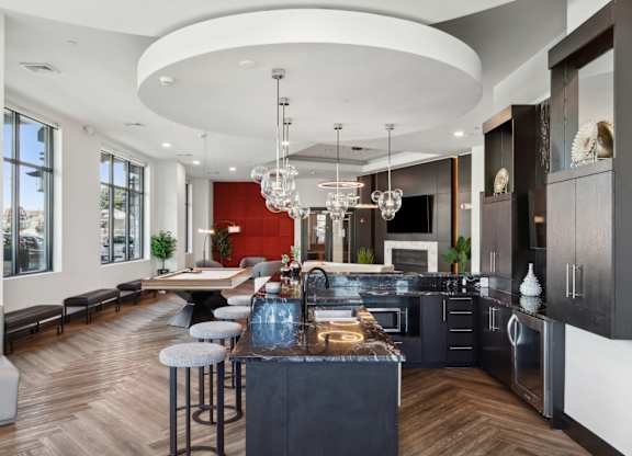 Community Kitchen with ample sitting and billiard table at Metro 303, Hempstead, New York 