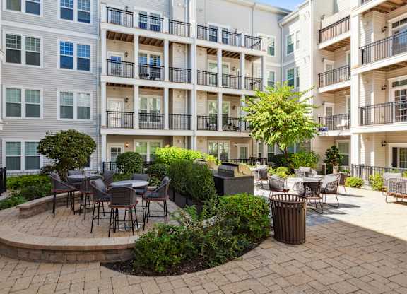 Spacious Patio With Sitting Arrangements at Metro 303, Hempstead