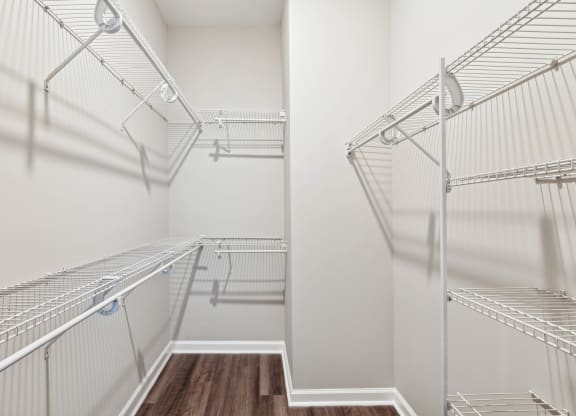 a spacious walk in closet with stainless steel shelves at Metro 303, Hempstead New York