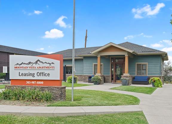 A leasing office for Mountain Vista Apartments is shown with a sign in front of the building at Mountain Vista Apartments, Colorado, 80228
