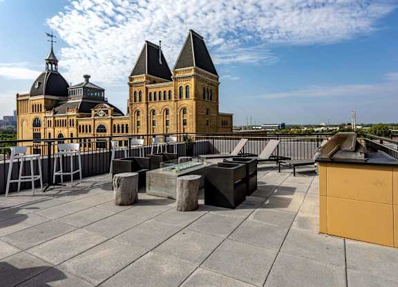 a view of a city with buildings and benches