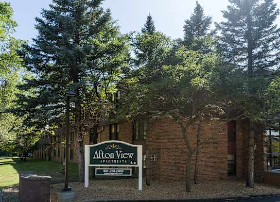 A sign that says Alton View in front of a building.