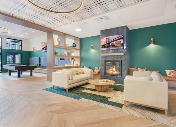 A living room with a fireplace and a couch.