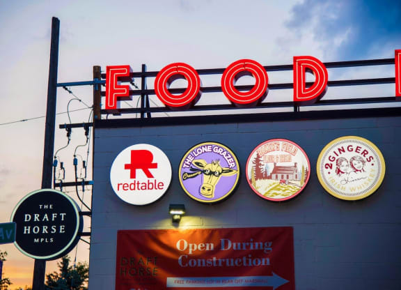 the facade of a building with various signs on it