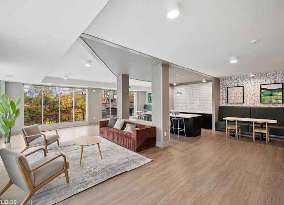 a living room with a couch and a table