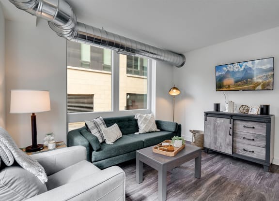 a living room with a couch and a table