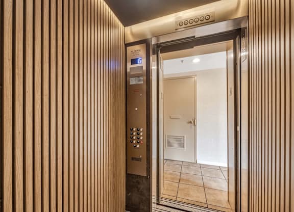 the entrance to the elevator in the lobby of a building