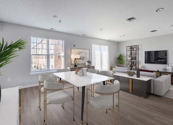 a living room and dining room with a white table and chairs
