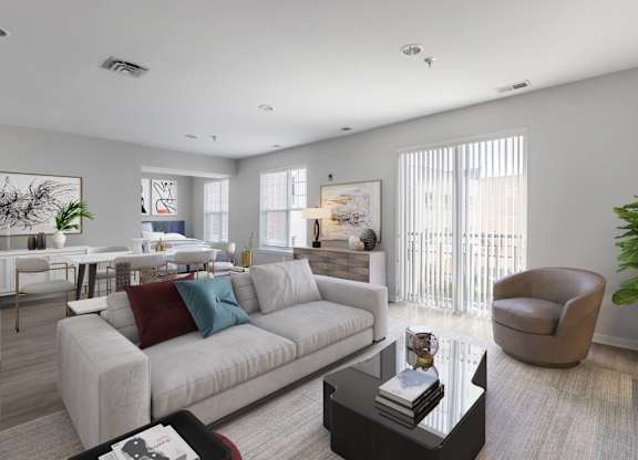 a living room with a white couch and a coffee table