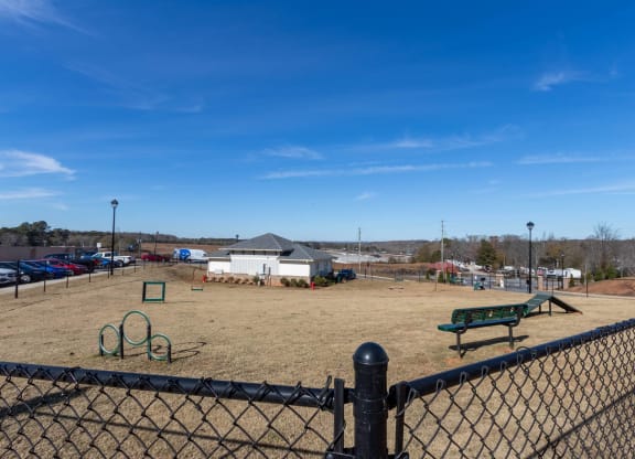 a dog park with agility equipment at Capstone at Banks Crossing, Commerce, Georgia