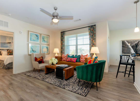 a living room with a couch at Capstone at Banks Crossing, Commerce, 30529