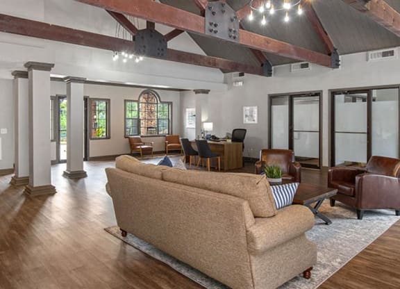 a large living room with a couch and chairs at High Ridge Apartments, Athens, GA 30606