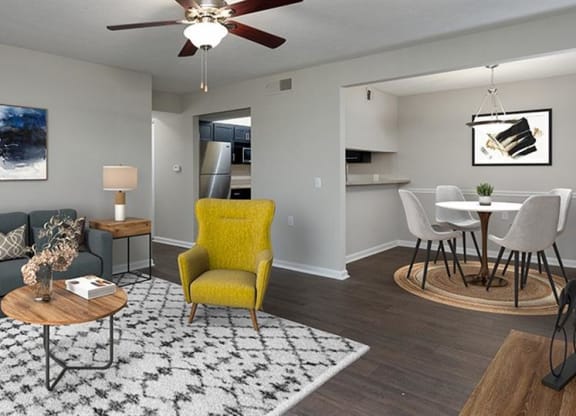 a living room with a couch and a table at High Ridge Apartments, Athens, GA