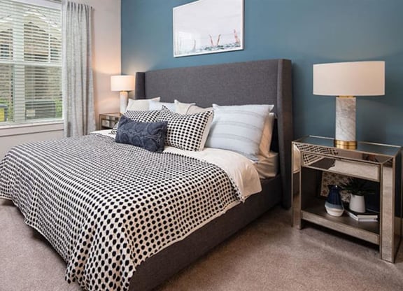 a bedroom with a bed and a window at Promenade at Newnan Crossing, Georgia, 30265