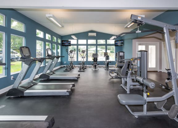 a room filled with lots of different types of exercise equipment at Misty Ridge Apartments, Woodbridge, VA 22191
