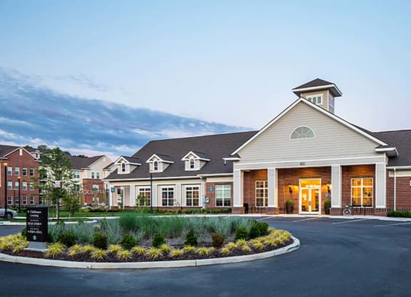 a building with a roundabout in front of it at Canopy at Ginter Park Apartments, Richmond, VA, 23227