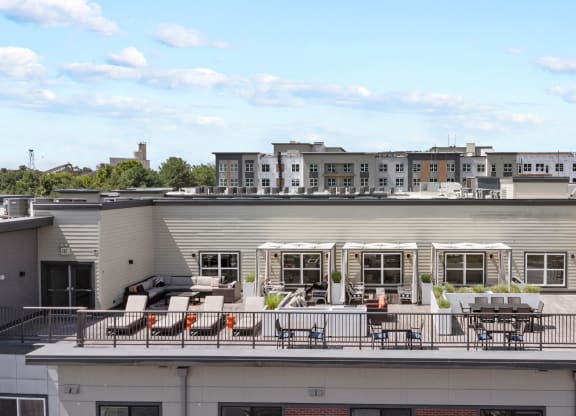 a view of the rooftop patio at the m on hennepin apartments in minneapolis at Rivergate, Woodbridge