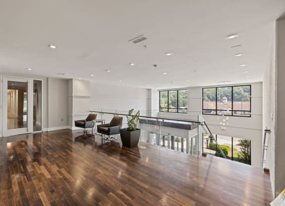 a large living room with hardwood floors and white walls at Rivergate, Woodbridge, VA, 22191