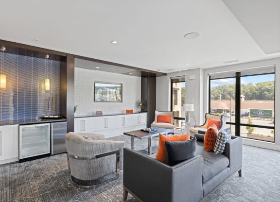 a living room filled with furniture and a large window at Rivergate, Virginia