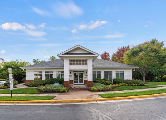 a home with a porch and a street in front of it SomerHill Farms Apartments, Gainesville, VA 20155