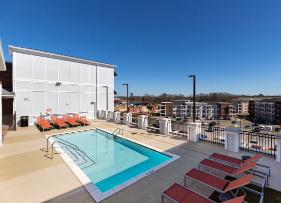 a view of the pool at homewood suites by hilton houston stafford sugar at The Flats at Southlawn Apartments, Lawrenceville, GA