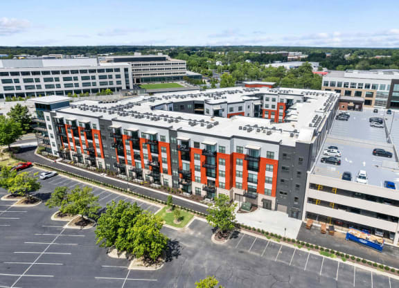 an aerial view of a large building with orange doors at Tapestry West, Richmond, 23230
