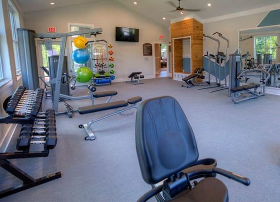 a gym with a lot of machines and chairs in it  at Lullwater at Big Ridge, Tennessee, 37343