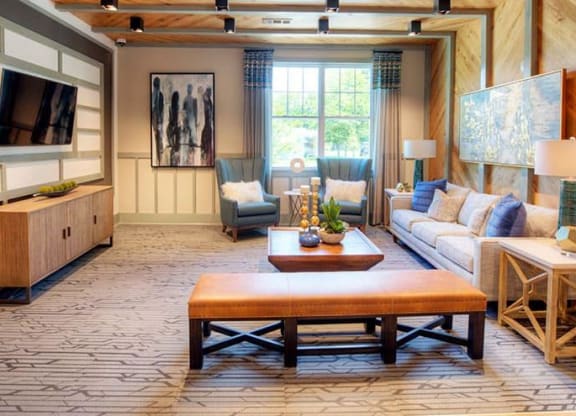 a living room with a couch and a table  at Lullwater at Big Ridge, Hixson, TN