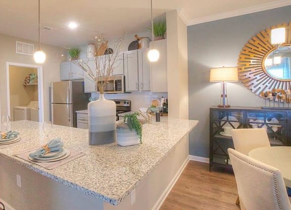 a kitchen with a counter top with plates on it  at Lullwater at Big Ridge, Hixson, Tennessee