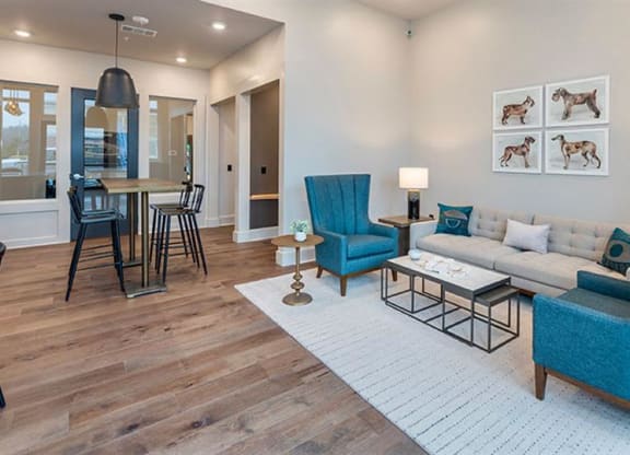 a living room with a couch chairs and tables at Livingston Flats Apartments, Chesterfield, ,23832