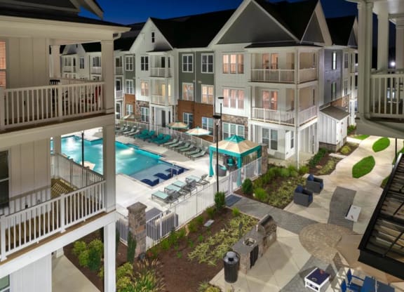 an aerial view of an apartment complex with a pool at Artistry at Winterfield Apartments, Virginia