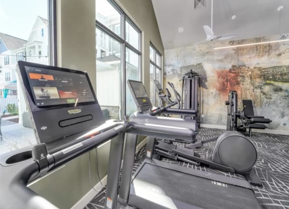 the apartments at masse corner 205 fitness room at Artistry at Winterfield Apartments, Midlothian