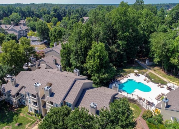 an aerial view of a house with a pool in the backyard at Hunters Chase Apartments, Midlothian, VA