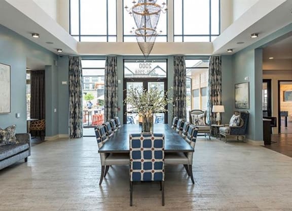 Grand clubhouse with open seating at 2000 West Creek Apartments, Virginia, 23238