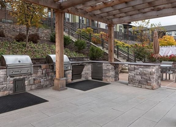 Outdoor kitchens at 2000 West Creek Apartments, Virginia, 23238