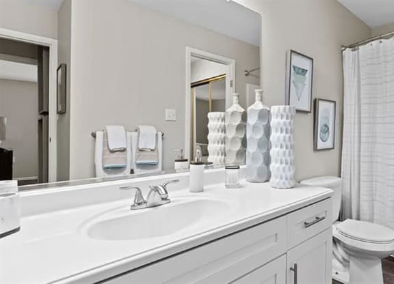a bathroom with a sink toilet and shower at Trails at Short Pump Apartments, Richmond ,23233