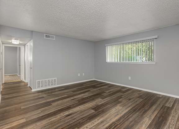 Bedroom with large window at Lifestyle at Shreveport Apartments, Louisiana