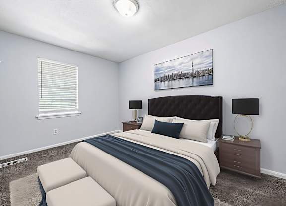 A bedroom with a large bed and a painting above it.