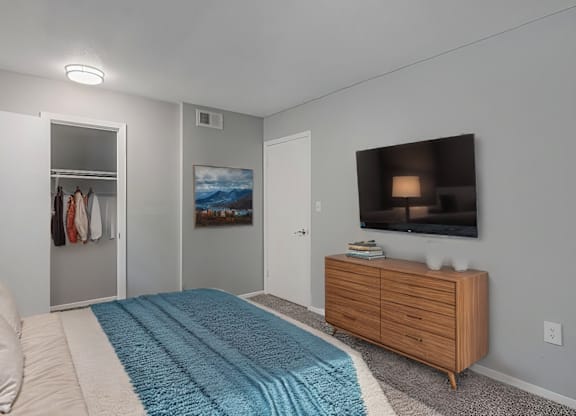 Bedroom With TV at Lifestyle at Shreveport Apartments, Shreveport, Louisiana