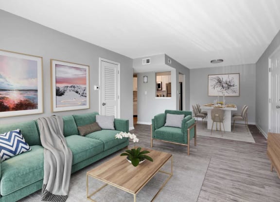 a living room with a couch and a table at Station JTown, Louisville, KY, 40299