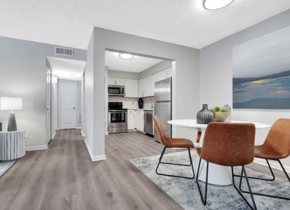 a kitchen and living room with a table and chairs at Enclave at Breckenridge Apartments, Kentucky, 40220