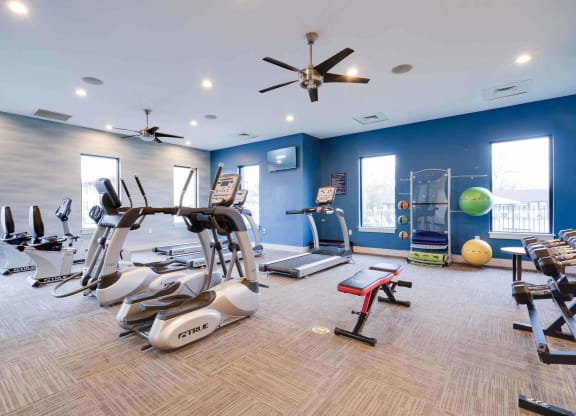 1-Bedroom Apartments In Louisville, KY - Enclave At Breckenridge - Fitness Center With Elliptical Machines, Treadmills, Yoga Balls, Workout Bench, Free Weights, Ceiling Fans, and Plenty of Windows.