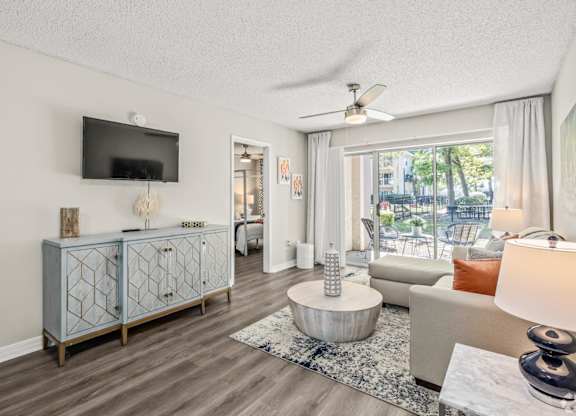 Living Room With TV at Coastline Apartments, Florida, 32547 