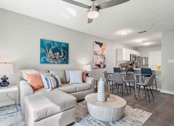 Living Room With Dining Area at Coastline Apartments, Florida  