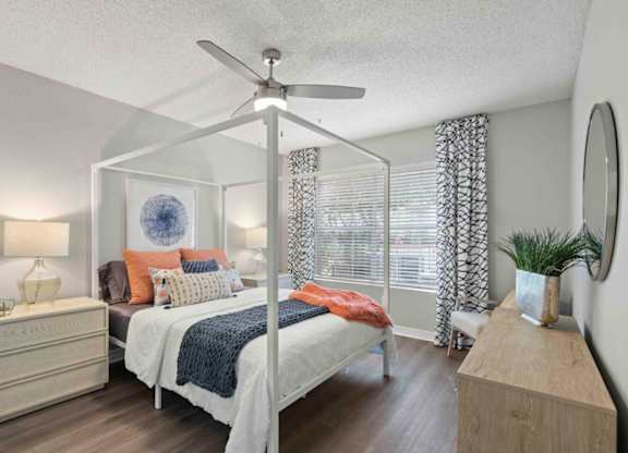 Bedroom With Ceiling Fan at Coastline Apartments, Florida, 32547 
