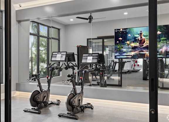 the residence has a gym with treadmills and exercise equipment at Mayla Pompano, Pompano Beach, Florida